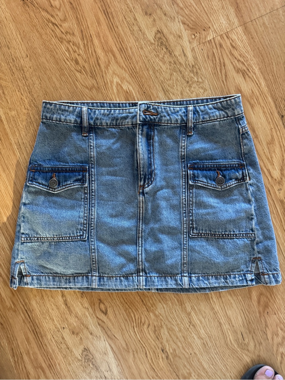 Vigoss Light Blue Denim Mini Skirt with Front Pockets